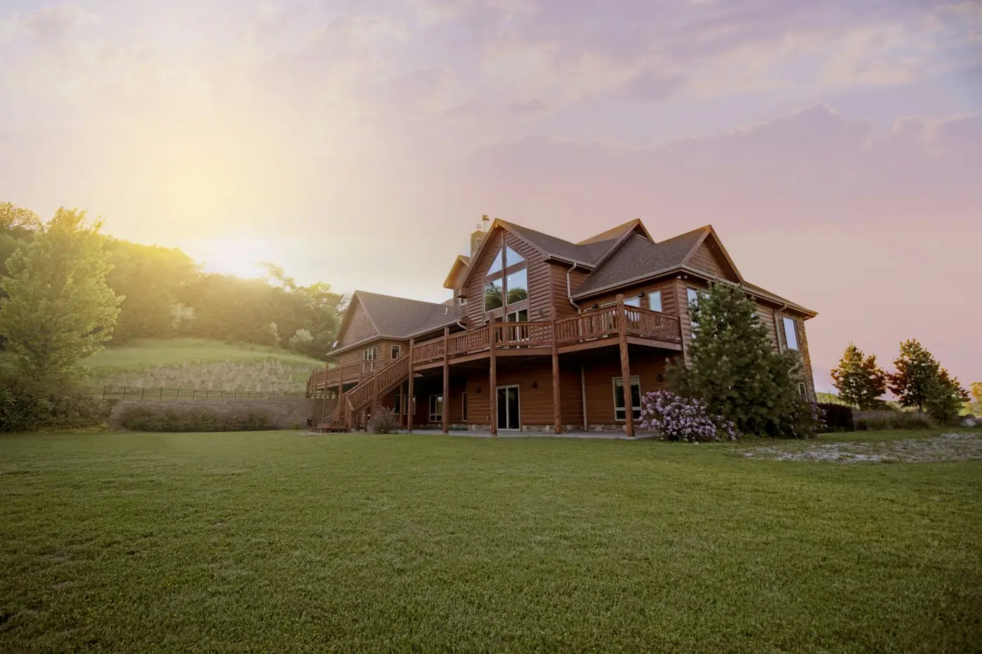 Home with a pitched roof at sunset