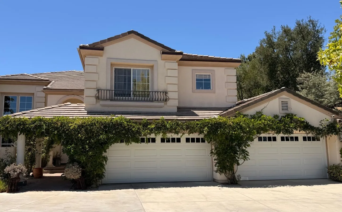 Front of the Agoura Hills home after the tile roof re-felt, with the original concrete tile on the street-facing slopes
