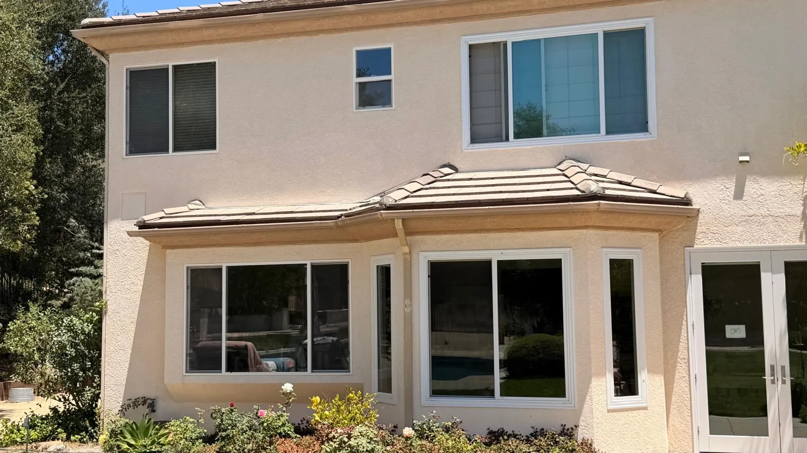 Relaid tile on the low roof over the back bay windows of the Agoura Hills home