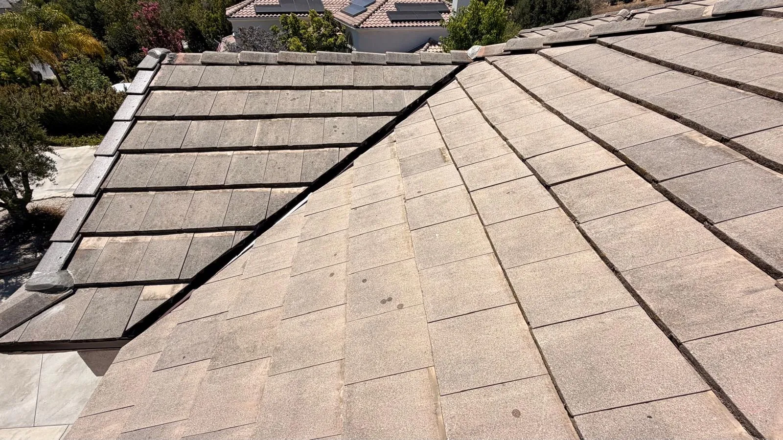 Relaid concrete flat tile meeting at a hip on the finished Agoura Hills roof