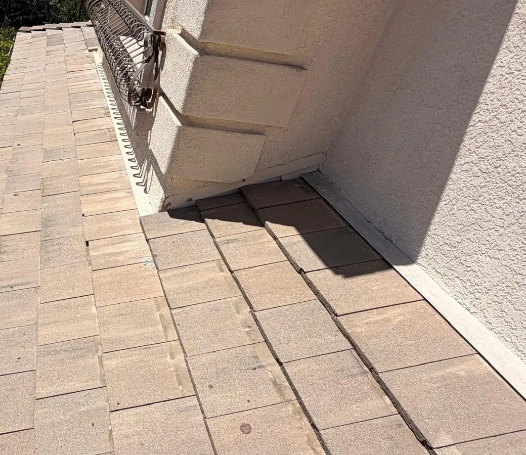 Finished side slope of concrete tile along the house wall in Agoura Hills